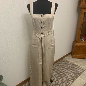 Poly linen blend jumpsuit. New with tags.